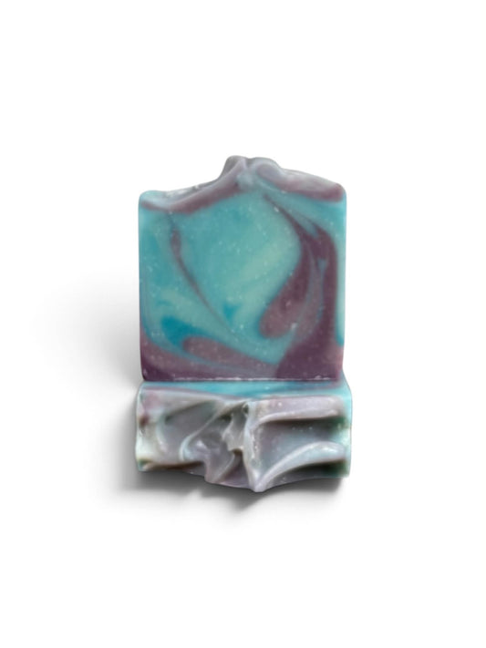 one bar of soap on top of another. Blue and purple swirls.