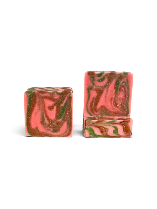 3 bar soaps with pink, green, and brown swirls.