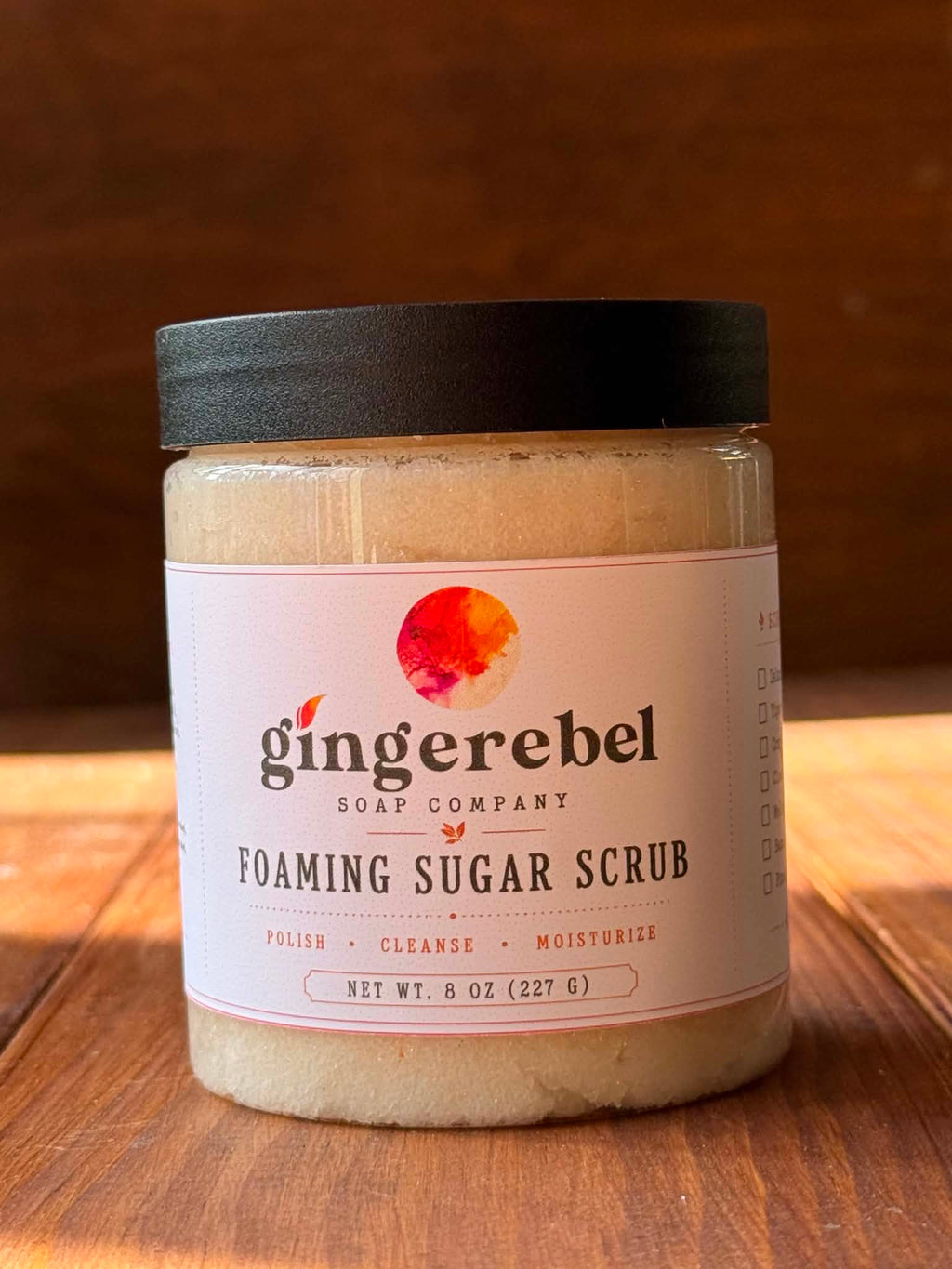 Jar of beige sugar scrub