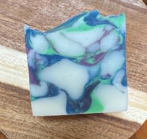 blue, green, purple and white soap
