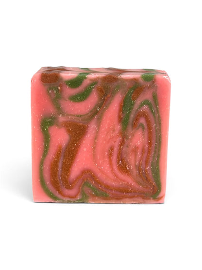 1 bar soap on a white background that is pink, green, and brown