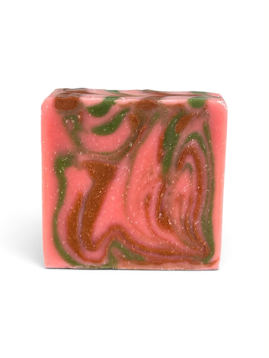 1 bar soap on a white background that is pink, green, and brown