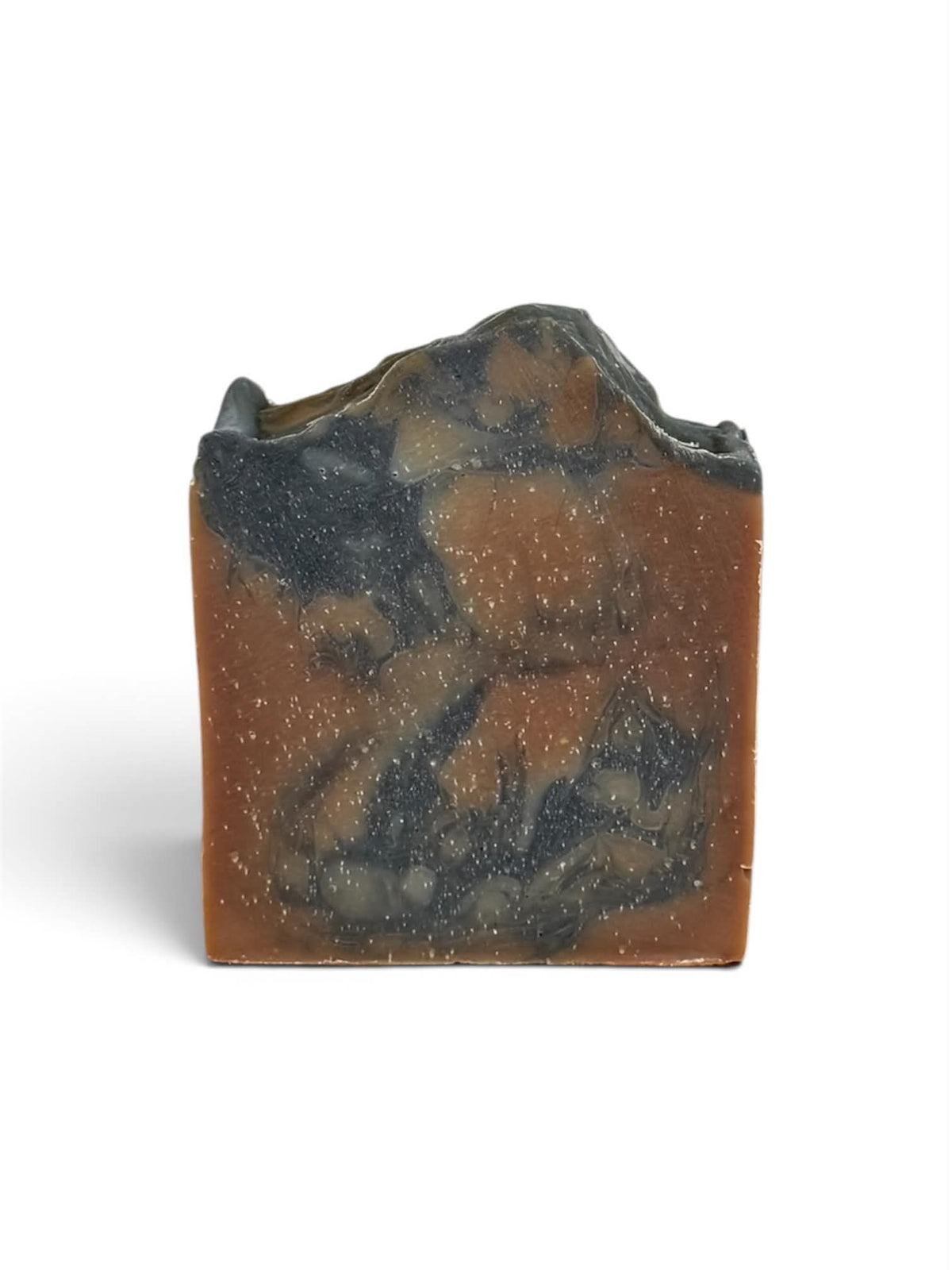 A single rectangular bar of handmade soap with a rustic, unevenly broken top, featuring a marbled pattern of burnt orange-brown and dark charcoal gray with tiny white speckles, set against a plain white background.