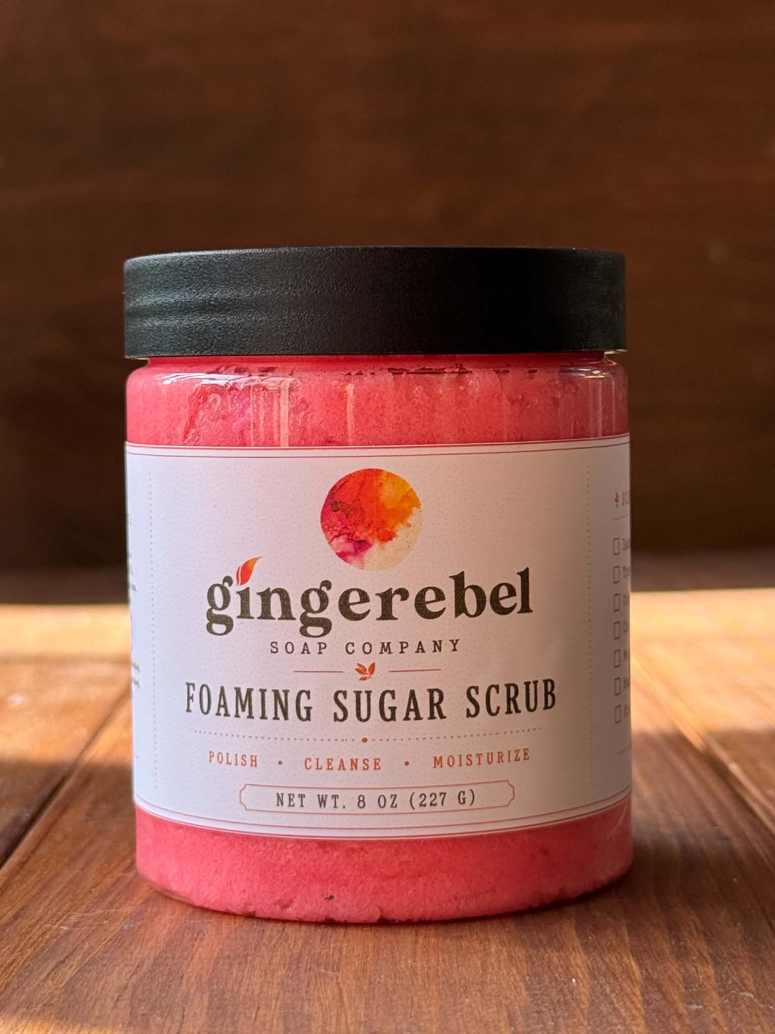 Jar of pink sugar scrub  