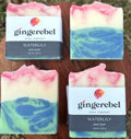 Gingerebel Waterlily bar soaps on a wooden surface