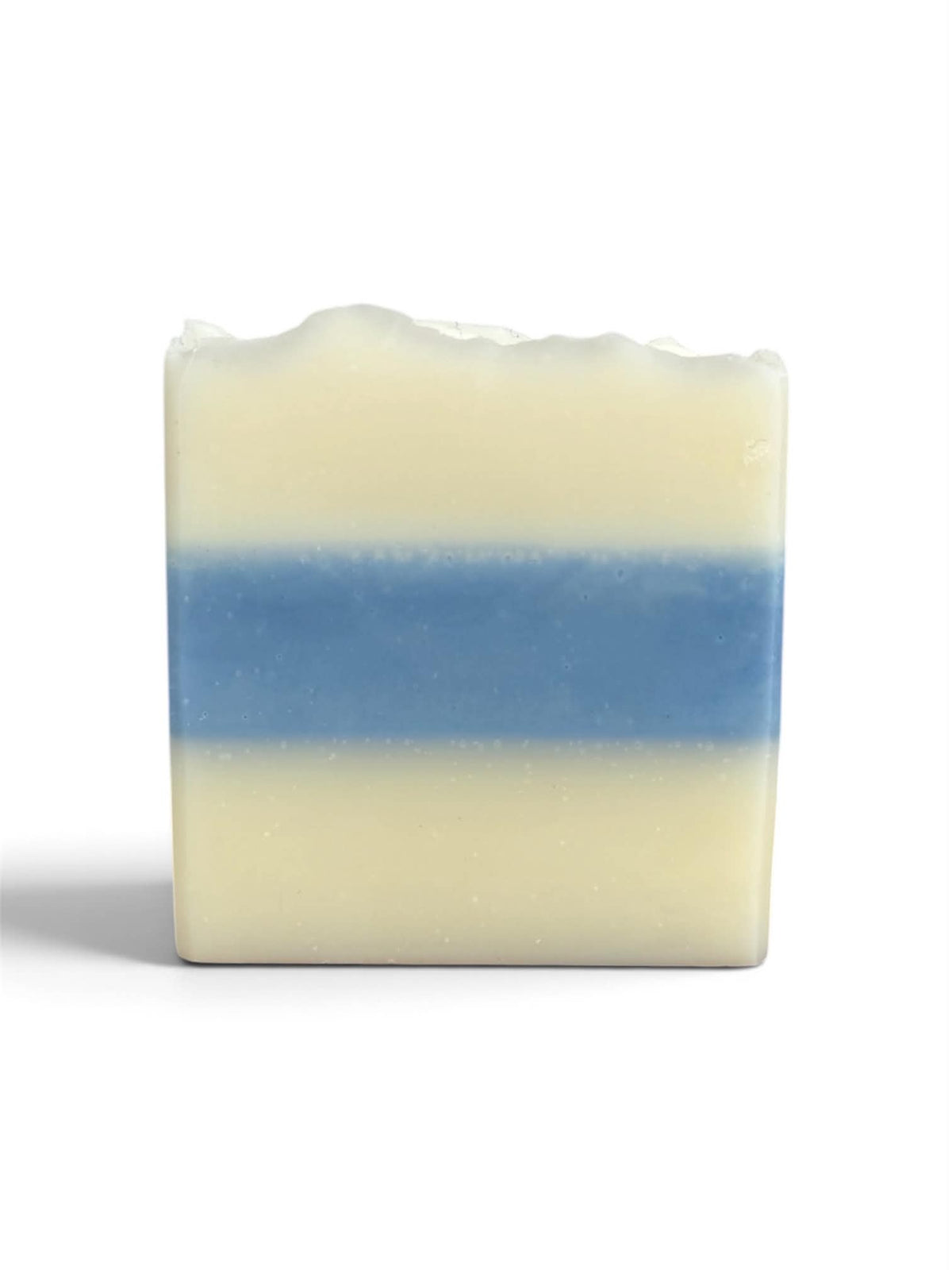 1 bar of white soap with a blue stripe in the middle. 