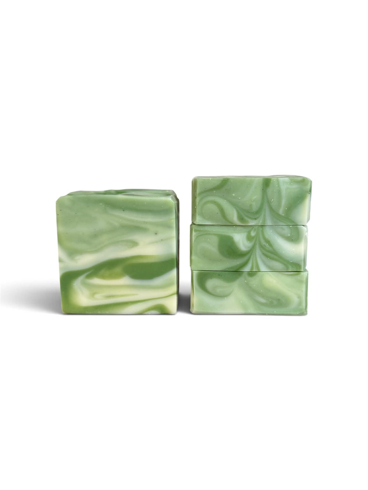 Three rectangular bars of soap with a green and white marbled swirl pattern, arranged on a plain white background.