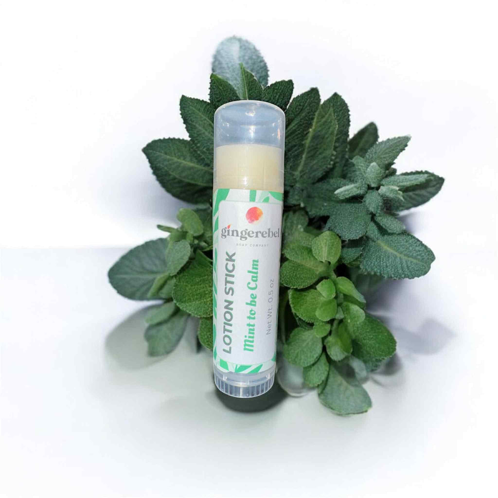 Lotion stick with green leafy background, scented with mint to be calm. 