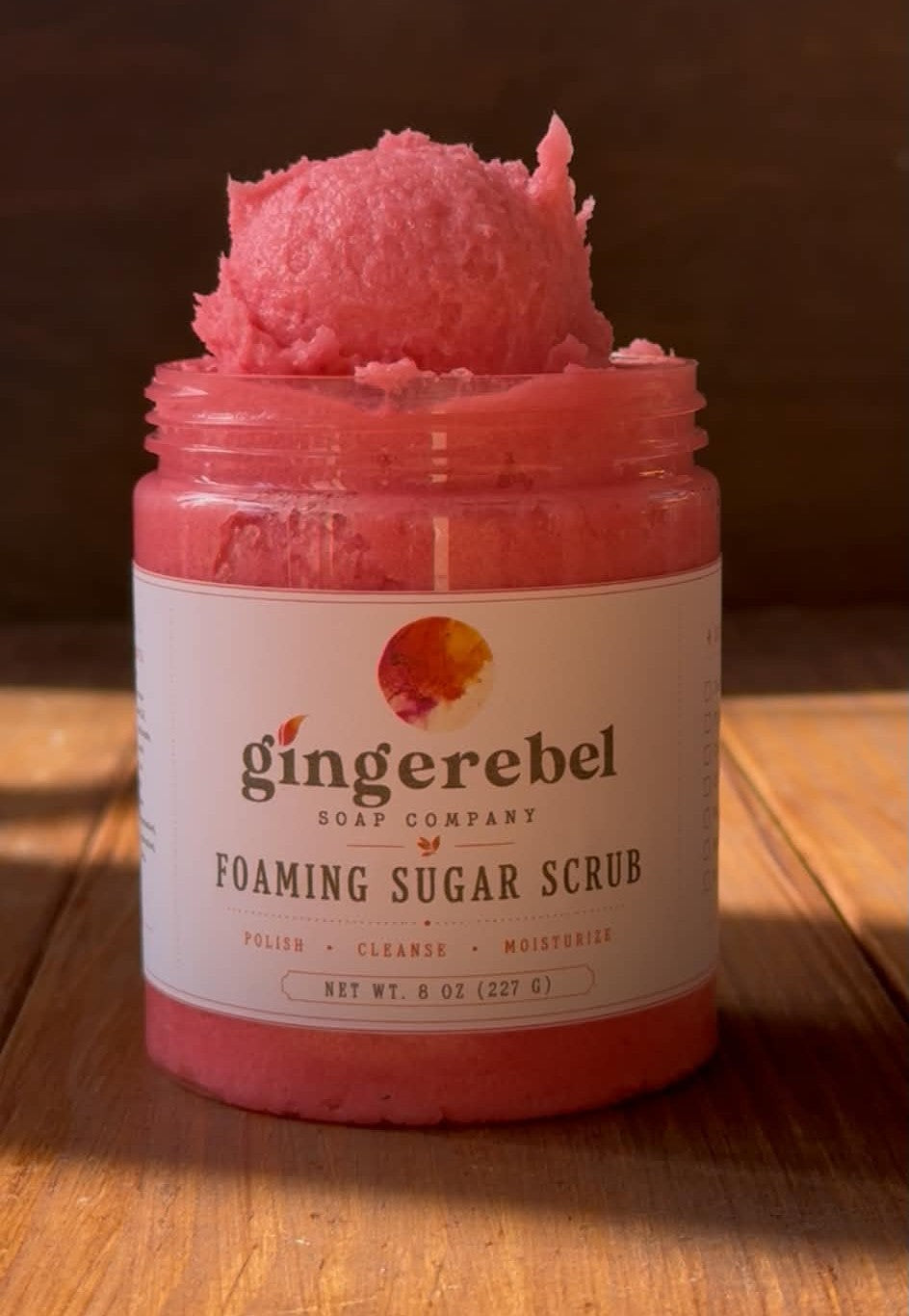 Jar of pink sugar scrub  