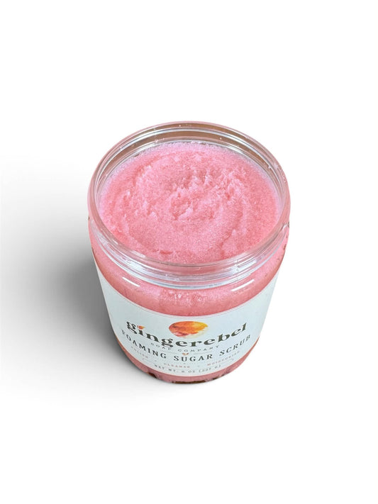 A clear plastic jar of Bingerel Foaming Sugar Scrub with pink scrub visible inside, set against a plain white background.