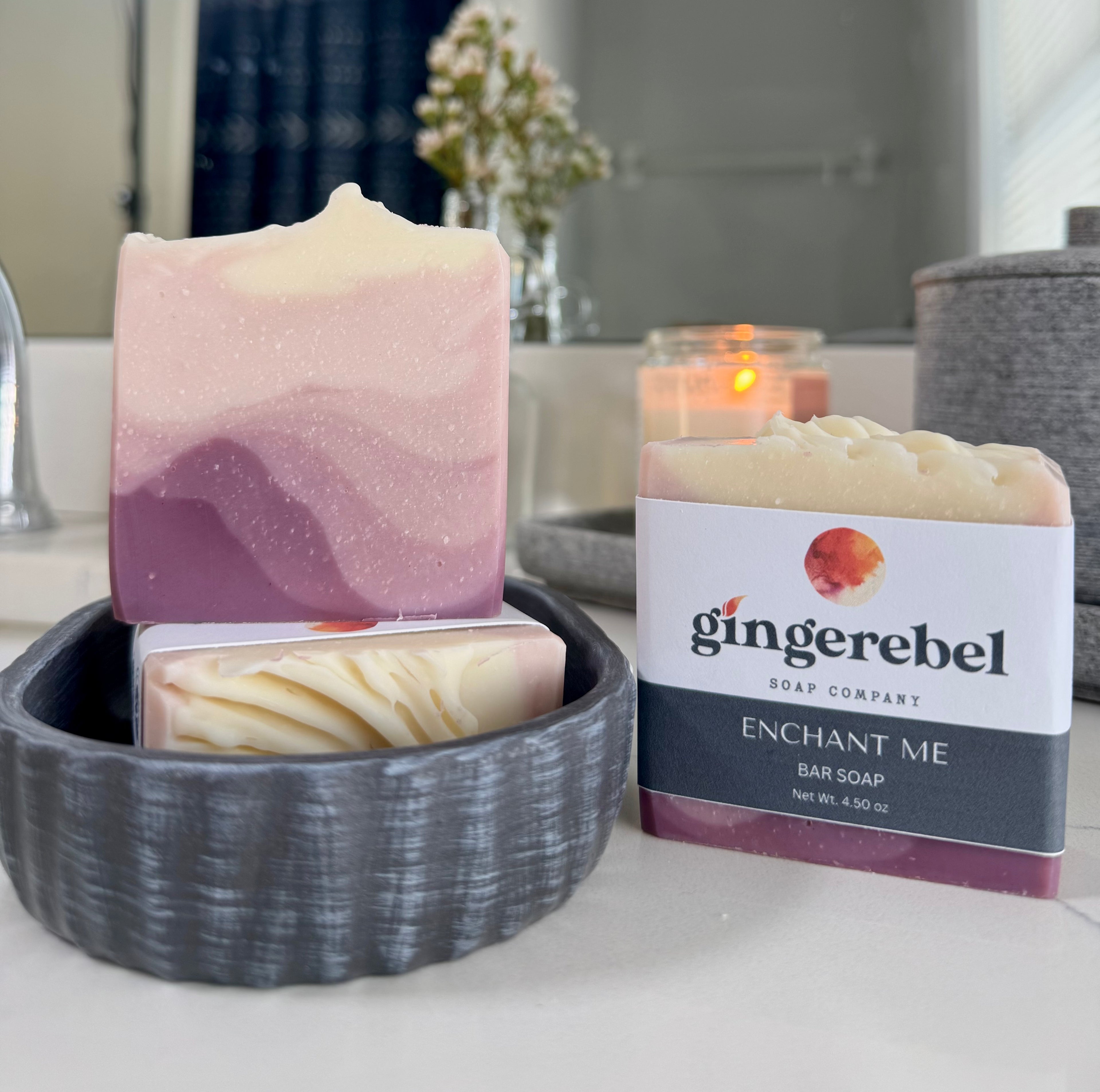 Bar soap with packaging from Gingerebel Soap Company on a bathroom counter.