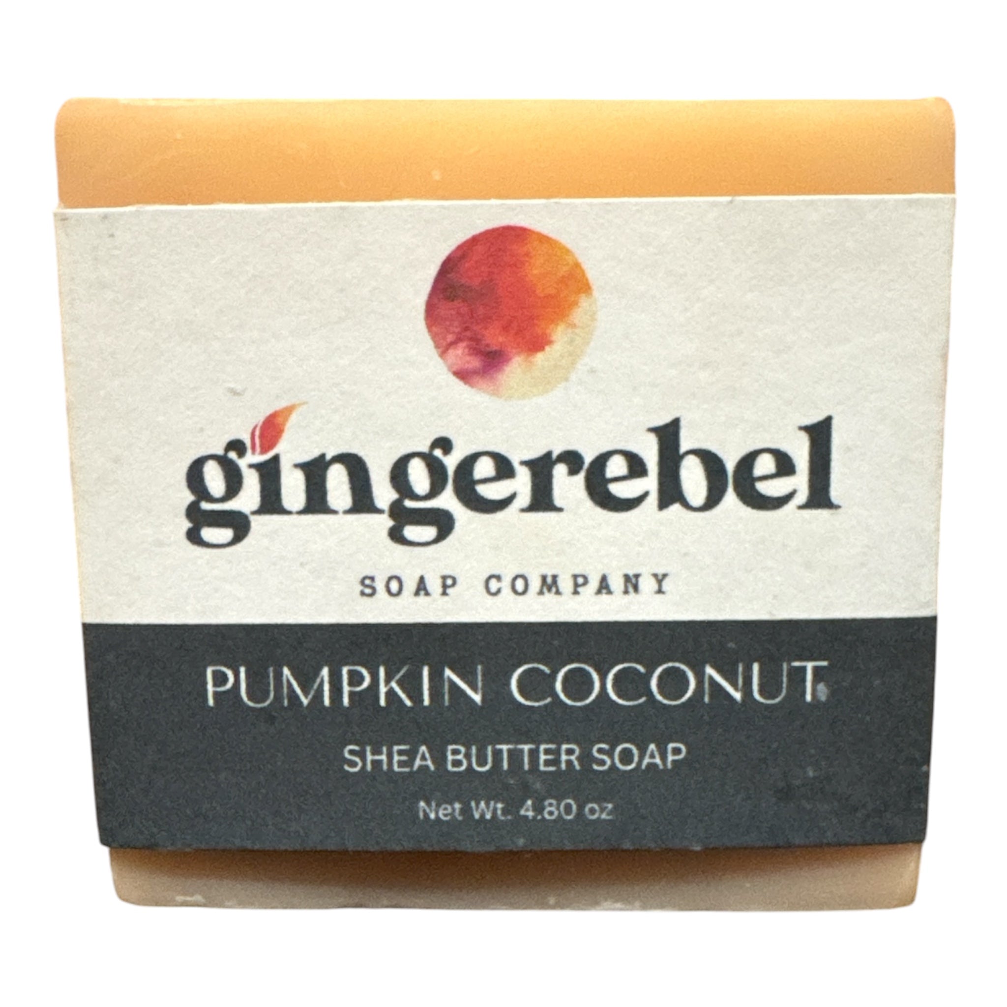 Bar soap of pumpkin coconut with gingerebel branding on a white background. 