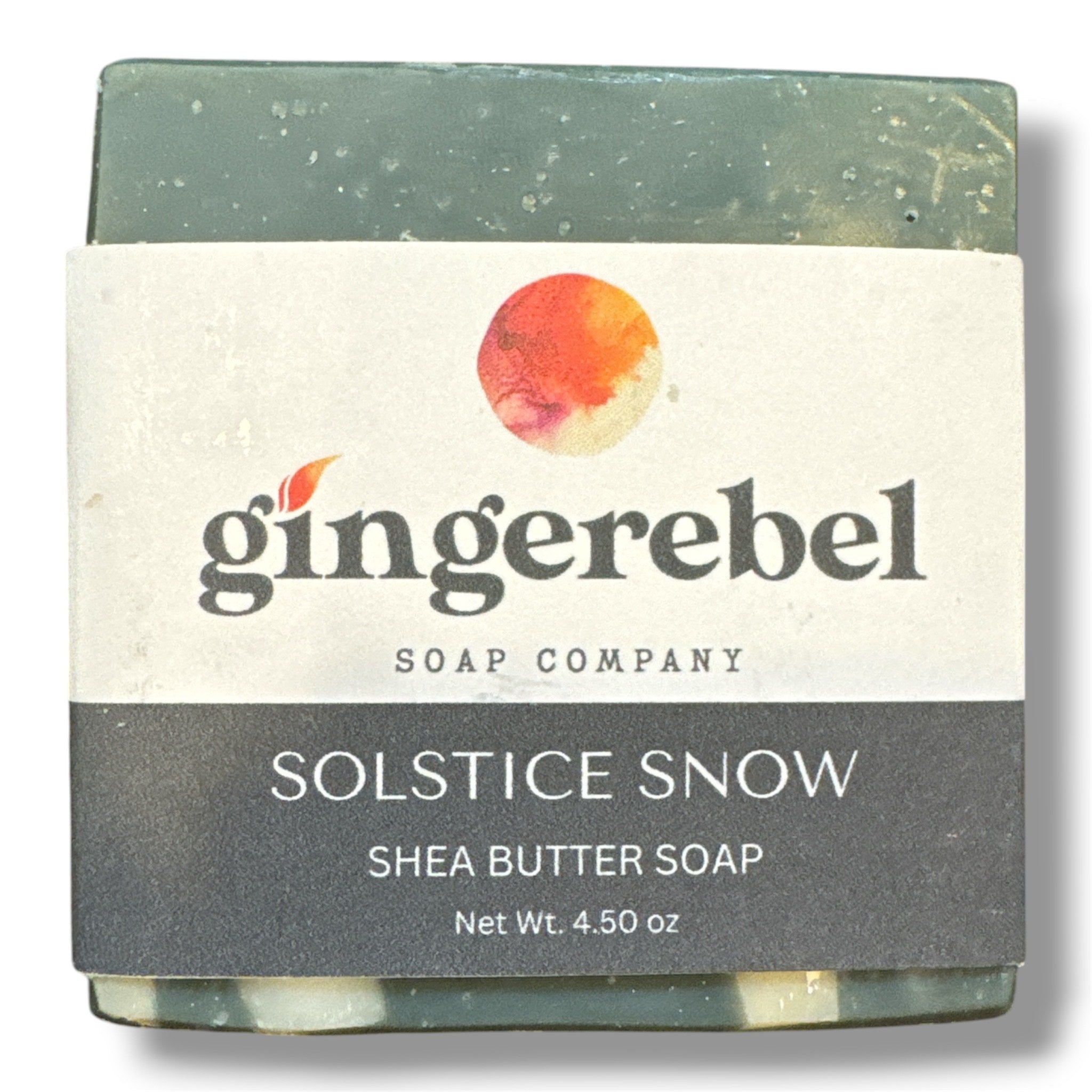 Solstice Snow bar soap with gingerebel branding on a white background. 