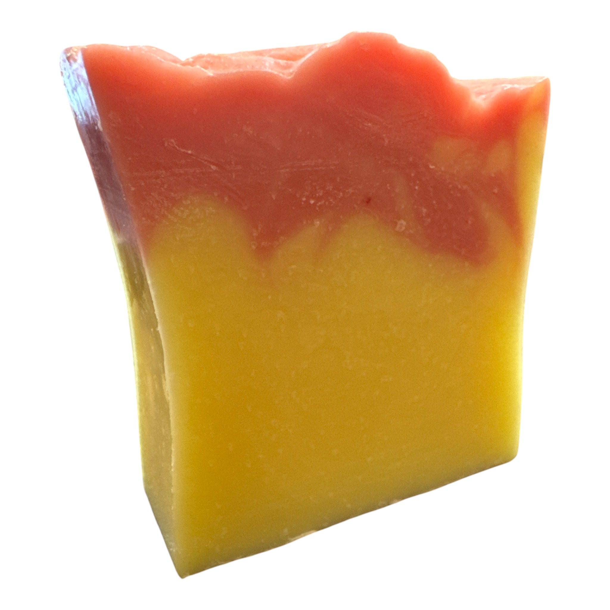 Bar of soap with a gradient from red to yellow on a white background
