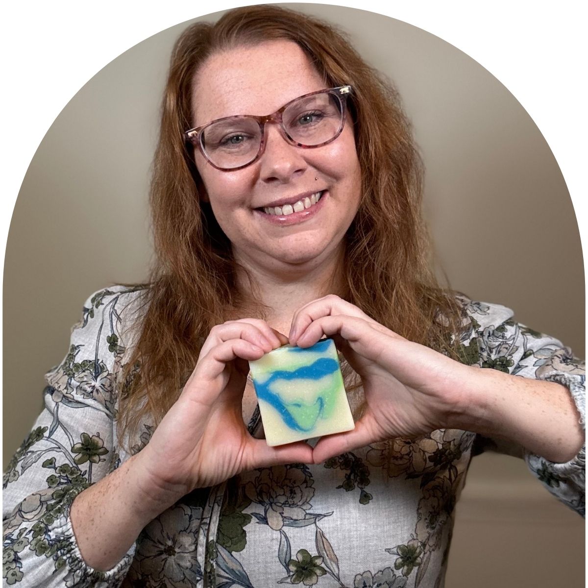 Owner holding a bar of soap