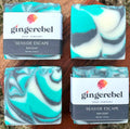 Gingerebel Soap Company Seaside Escape bar soaps on a wooden surface